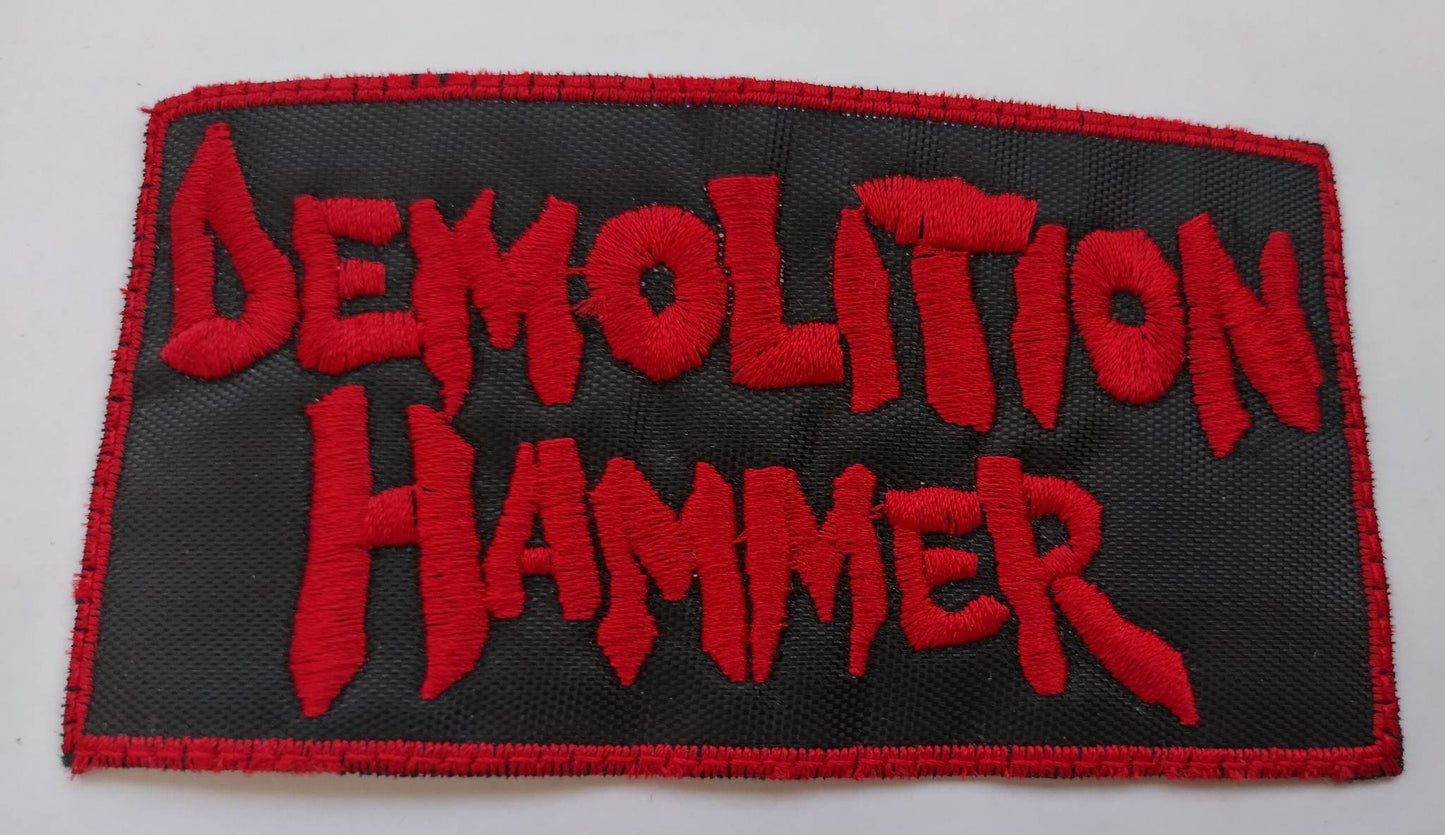 Demolition Hammer name Patch red letters