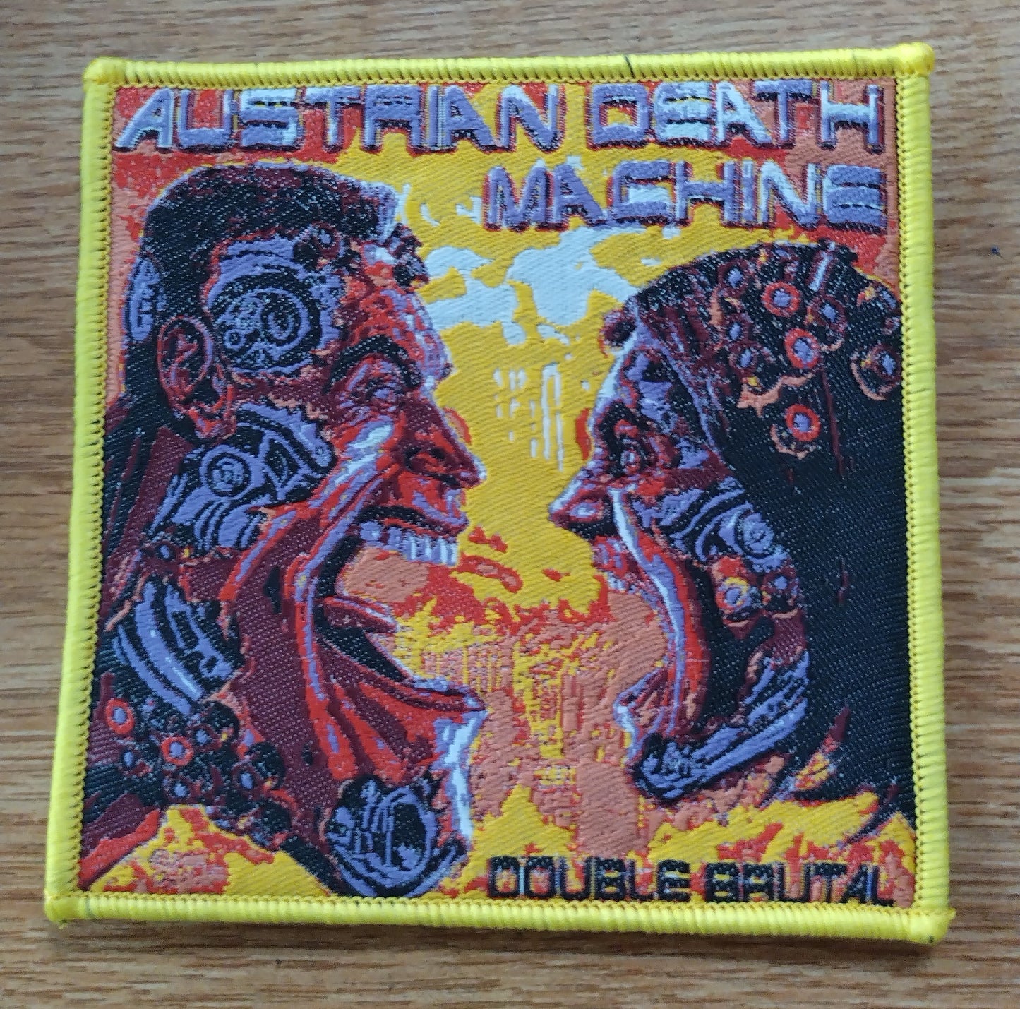 Austrian Death Machine double brutal yellow border Woven Patch