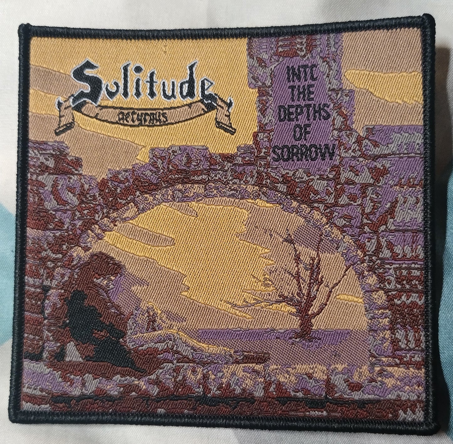 Solitude into the depths of sorrow Woven Patch