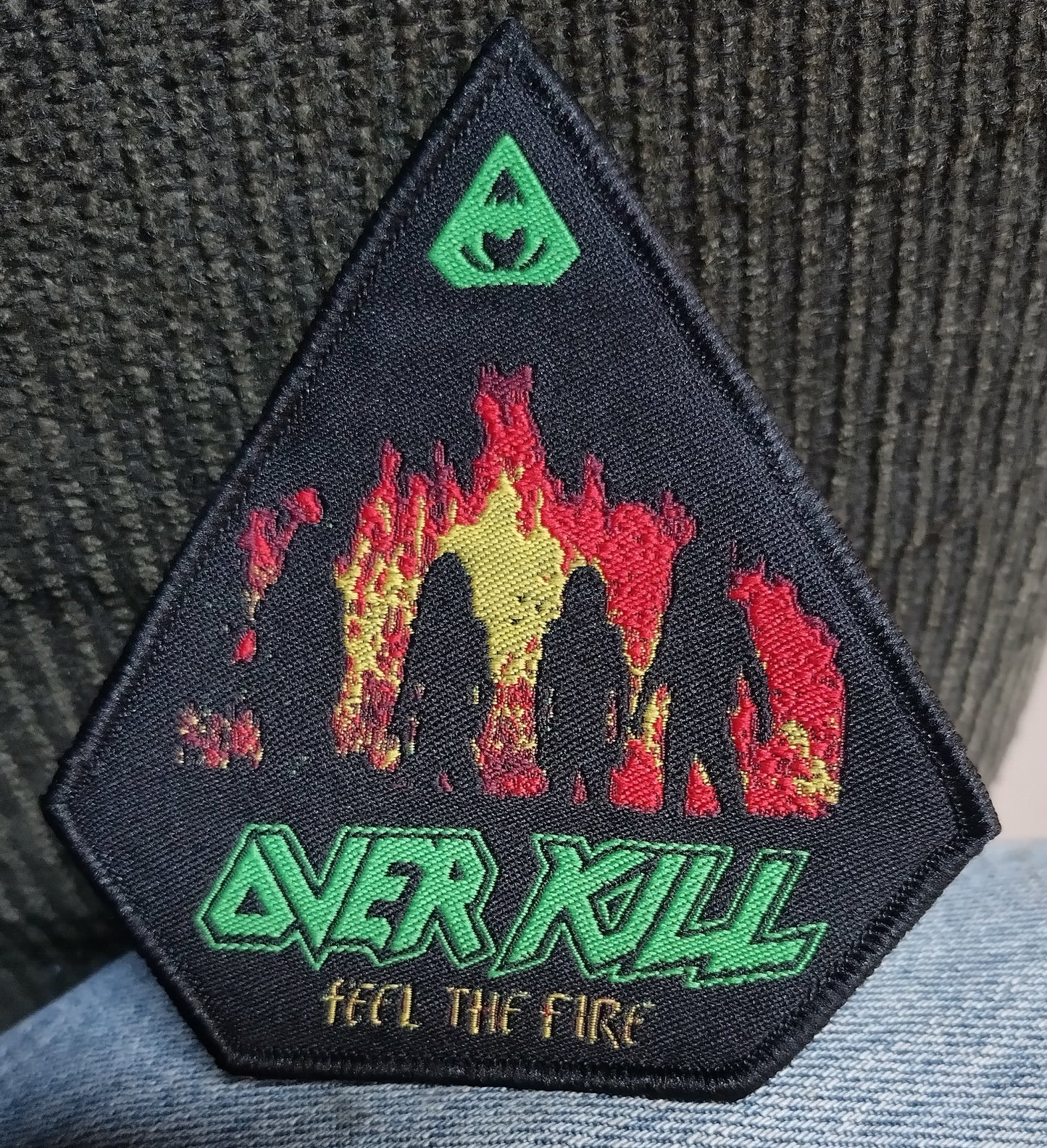 Overkill feel the fire black border Woven Patch