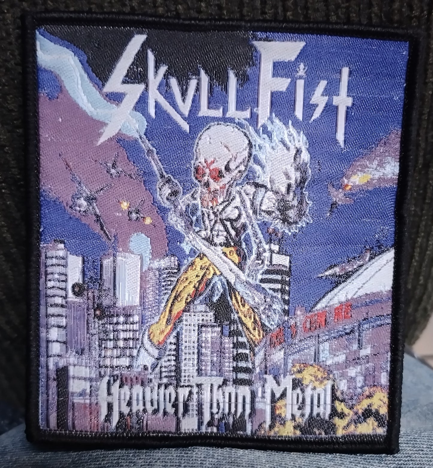 Skull Fist Heavier than metal Black border Woven Patch